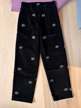 Noah NYC Black Corduroy Pants with White Embroidered Motifs